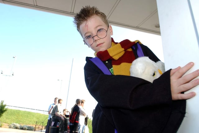 This Harry Potter fan is dressed up all ready to see the new Harry Potter film in 2004.