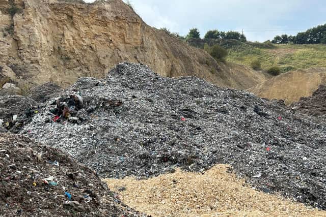 The mounds of shredded household waste at Hart Quarry.