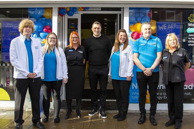 Former Hartlepool United player and manager Graeme Lee (centre) officially opened the new Utilita Energy High Street Hub in York Rd Hartlepool.