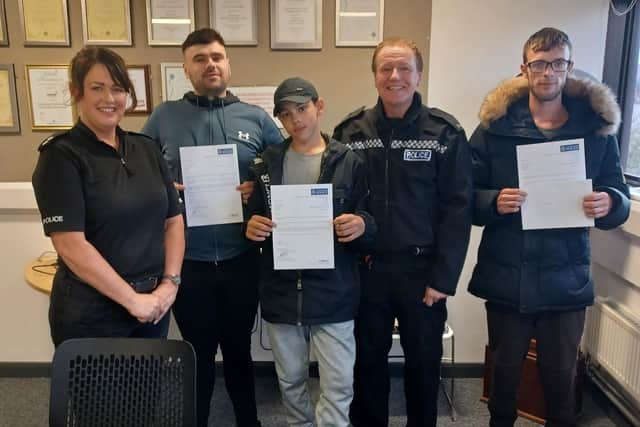 Pictured from left to right: Jordan, Tyler and John with T/Inspector Kelsey and PC Coggin/Photo: Hartlepool Neighbourhood Police Team