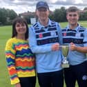 James Piper (centre left) and Ben Scott holding the Ian Jackson Memorial Cup with Ian's wife Louise Jackson and Hartlepool Cricket Club Chair Alan Jackson.