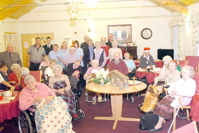 Residents gather at the Hospital of God for a carol service in 2009.