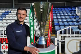 Luke Molyneux admits the prospect of getting to Wembley is real after seeing the Papa John's Trophy up close and personal during the EFL's media tour day. Picture by FRANK REID
