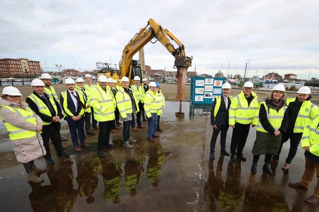 Councillors, officers and contractors mark the start of preparatory work at the site of the forthcoming Highlight leisure centre.