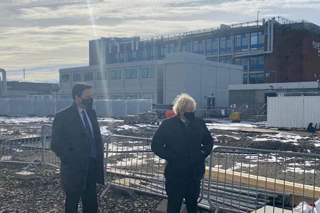 Tees Valley Mayor Ben Houchen, left, and Prime Minister Boris Johnson, centre, at Fujifilm Diosynth, in Billingham, on Saturday, February 13.
