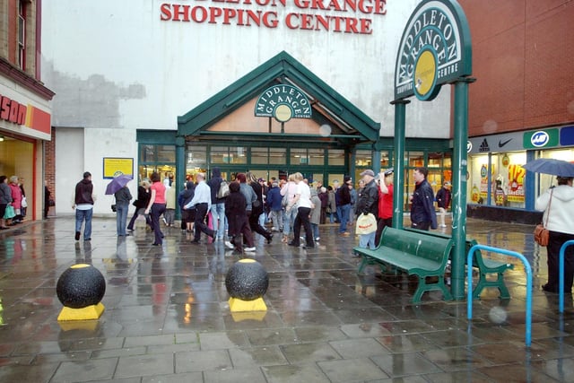 The entrance to the shopping centre looked a bit different back in 2005. Shoppers were outside after the centre was evacuated.