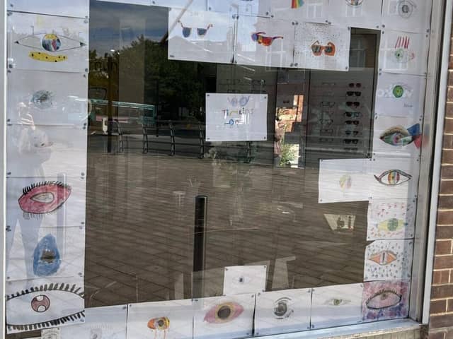 Pupils' designs on display at Timlin Optometrists.