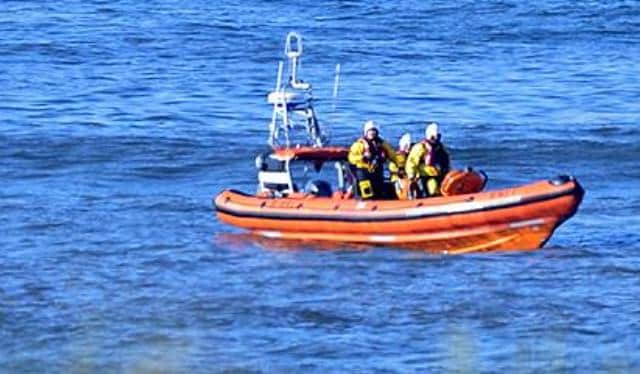 Hartlepool RNLI inshore lifeboat 'Solihull' and volunteer crew pictured at the scene of the incident.