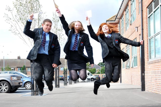 Pupils Lewis Robinson, Beth Scott and Kathyrn Smurthwaite jump for joy after getting their GCSE results in 2012.