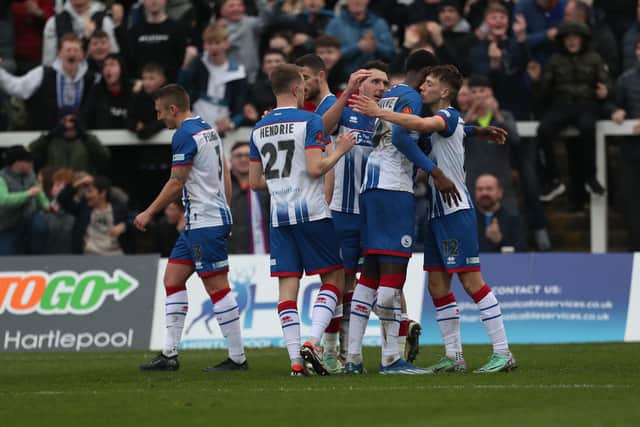 Joe Grey celebrates with his team mates after scoring Pools' equaliser late in the first half. (Photo: Mark Fletcher | MI News)