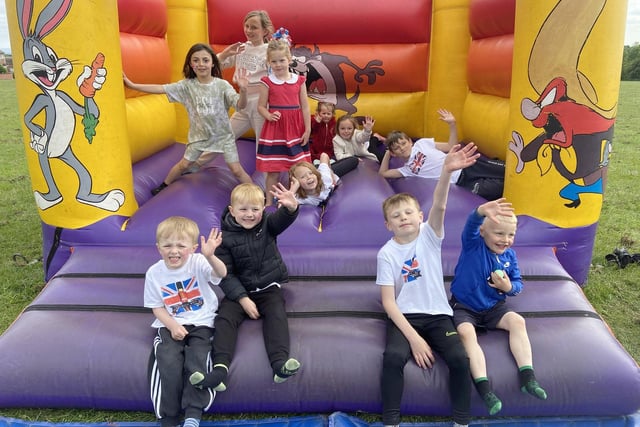 Young residents of Lanark Road in Hartlepool enjoying the bouncy castle at the Jubilee Party. Picture by FRANK REID