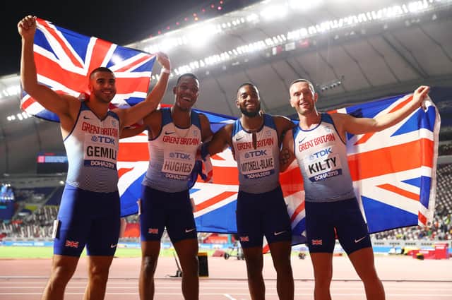 DOHA, QATAR - OCTOBER 05: Adam Gemili, Zharnel Hughes, Richard Kilty and Nethaneel Mitchell-Blake of Great Britain celebrate silver in the Men's 4x100 Metres Relay during day nine of 17th IAAF World Athletics Championships Doha 2019 at Khalifa International Stadium on October 05, 2019 in Doha, Qatar. (Photo by Michael Steele/Getty Images)