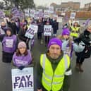 David Newey, UNISON area organiser (front right) and Yvonne Tait, senior healthcare assistant at the University Hospital of Hartlepool (front left) stand outside the University Hospital of Hartlepool alongside their fellow colleagues who are also striking in dispute of pay.