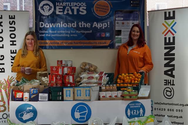Teresa Driver, left, and Jade Bromby with some of the food provided by donations from Hartlepool Eats, Asda and The Dyke House Big Local Partnership.