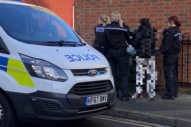 A suspect is detained by police during a raid in Cornwall Street, Hartlepool, on Tuesday, March 17, as part of Operation Sentinel. Picture by Frank Reid