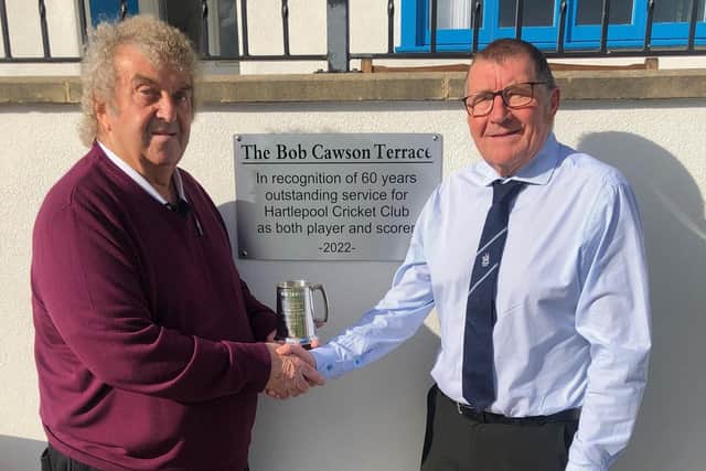 Bob Cawson (left) with Hartlepool Cricket Club Chairman Alan Jackson in front of the Bob Cawson Terrace at Park Drive.