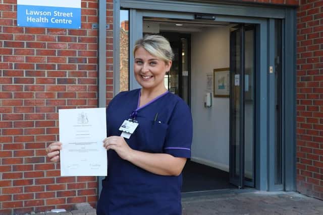 Hayley Adams, 27, receives a prestigious nursing award.