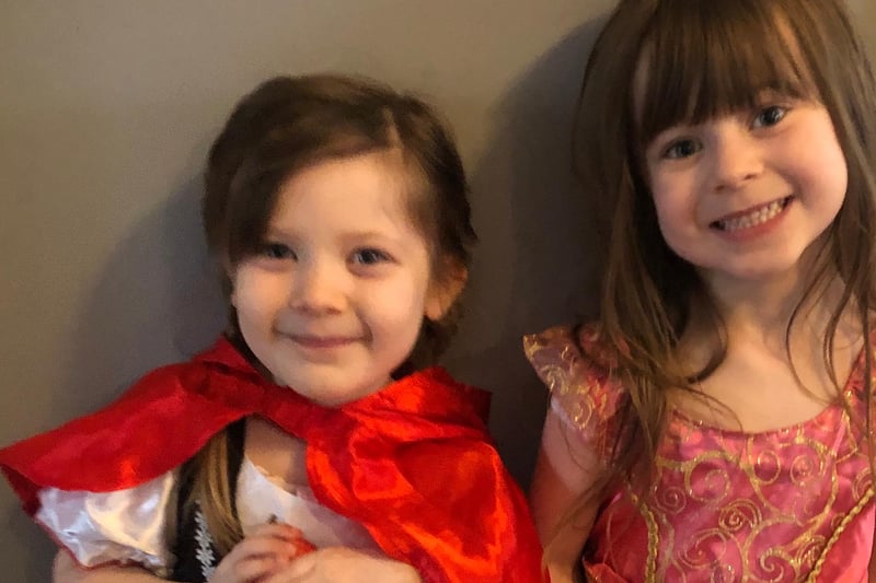 Lexie, aged four, who is at nursery and her five-year-old sister all dressed up