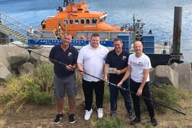 Pictured during the presentation are (left to right) Rob Archer,  Hartlepool RNLI, Jay Lee, fishing rod maker and fundraising organiser, Chris Hornsey, Hartlepool RNLI and Richard Hill, fishing rod winner.