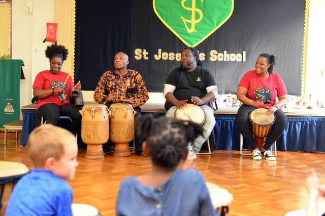 St Joseph's Primary School pupils join in an African drumming session with visitors from Transformers HPL.