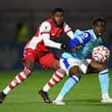 BOREHAMWOOD, ENGLAND - NOVEMBER 26: Ryan Alebiosu of Arsenal challenges Osazee Aghatise of Derby during the Premier League 2 match between Arsenal U23 and Derby County U23 at Meadow Park on November 26, 2021 in Borehamwood, England. (Photo by David Price/Arsenal FC via Getty Images)