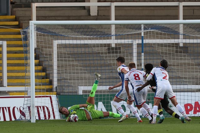 Made a string of excellent saves, particularly from Headley in the first half. Determined to keep a clean sheet and did so. Top display. (Credit: Mark Fletcher | MI News)