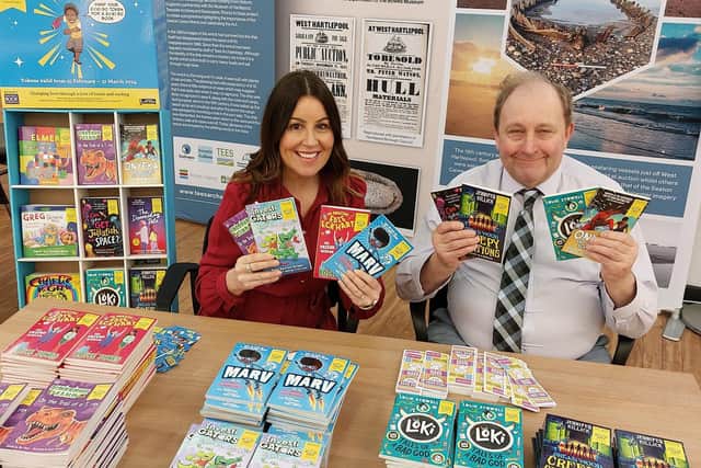 Priscilla Deane, assistant hub coordinator, community outreach and engagement, and Councillor Bob Buchan encourage pupils to get involved in World Book Day 2024.