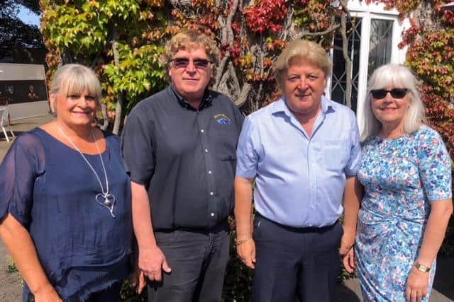Hardwicke Hall Manor Hotel joint owner David Bradley, second left, with wife Alison, far left, joint owner Alan Bradley, third left, and his wife, Susan, far right.
