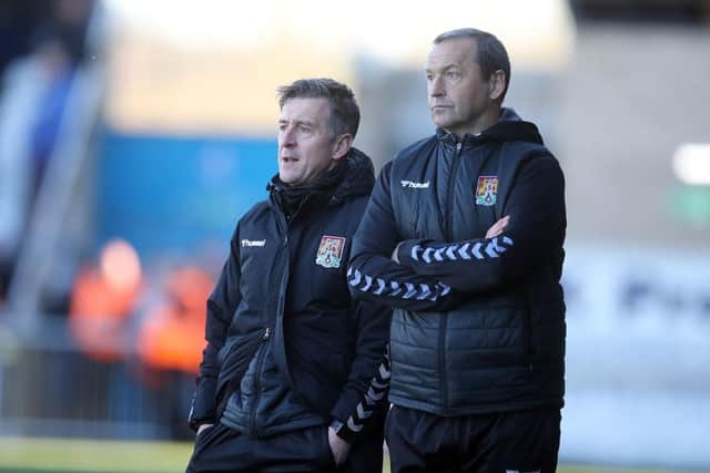 Jon Brady and his assistant Colin Calderwood look on during the League Two match between Northampton Town and Bristol Rovers at Sixfields (Photo by Pete Norton/Getty Images)