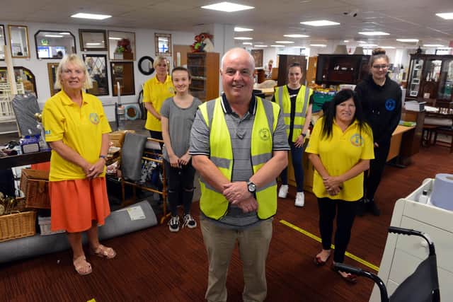 Dave Hunter and the volunteer team in the new community shop Poolie Time Emporium.