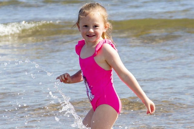 Lola Cosgrove makes the most of the summer holidays with a dip in the sea.