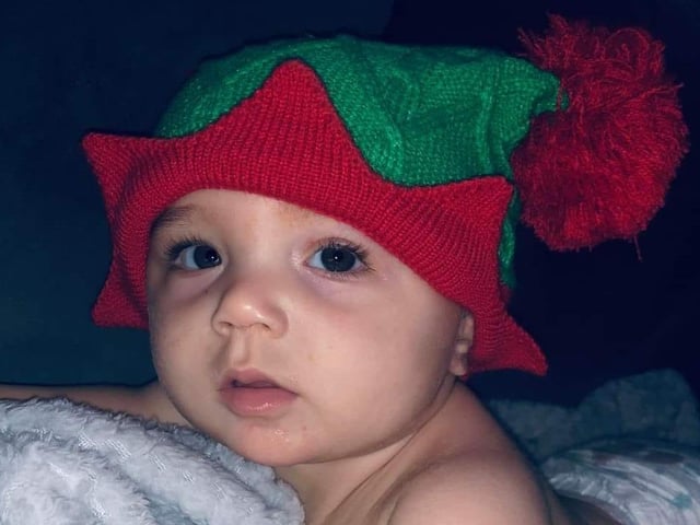Aliza Faith Burnside, age 8 months, ready to celebrate Christmas.