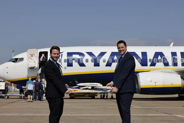 Ben Houchen with Jacob Young MP with a Ryanair celebration cake