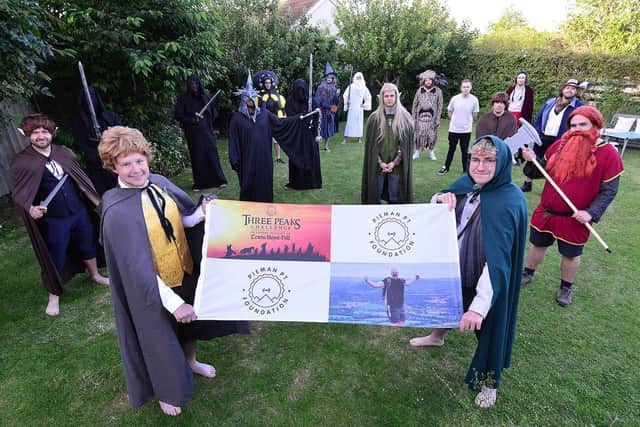 The fellowship of friends in Lord of the Rings fancy dress before taking on their first fundraising challenge in 2021. Photo: Frank Reid