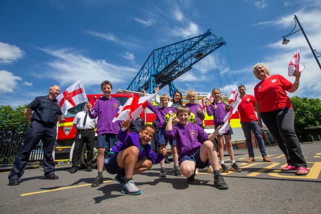 Cleveland Fire Brigade’s Andrew Bright, teaching assistant Christine Walpole, Head of Commercial at Middlesbrough FC Lee Fryett, Middlesbrough Council’s road safety officer Lynn Hepworth, and pupils from St Bernadette’s Primary School in Middlesbrough.
