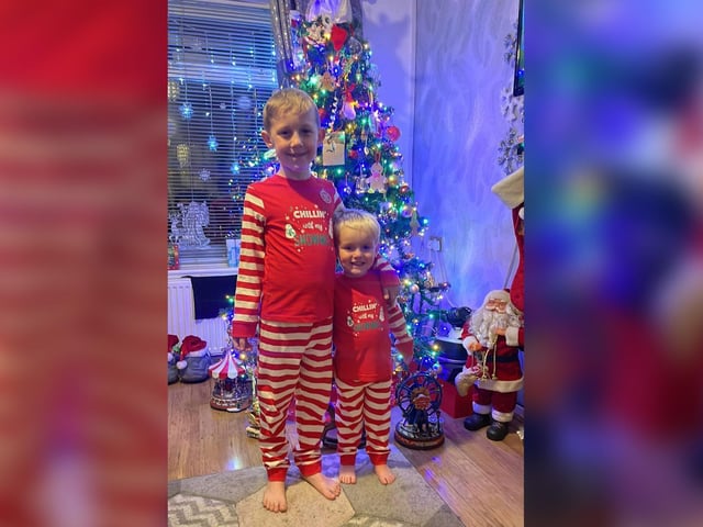 Rhylie and Teddie don their Christmas pyjamas.