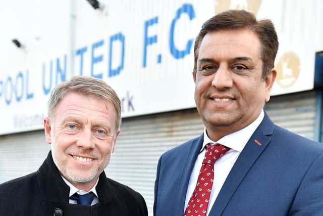 Craig Hignett with Hartlepool United chairman Raj Singh.