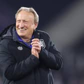Neil Warnock led Huddersfield  out of relegation and has now decided to stay on at the Terriers