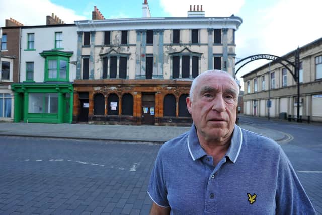Peter Joyce outside of the former Shades nightspot at the corner of Church Street and Lynn Street, Hartlepool. Picture by FRANK REID