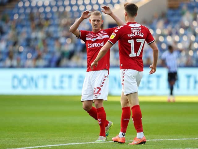 Paddy McNair and George Saville after Middlesbrough's first goal at Sheffield Wednesday.
