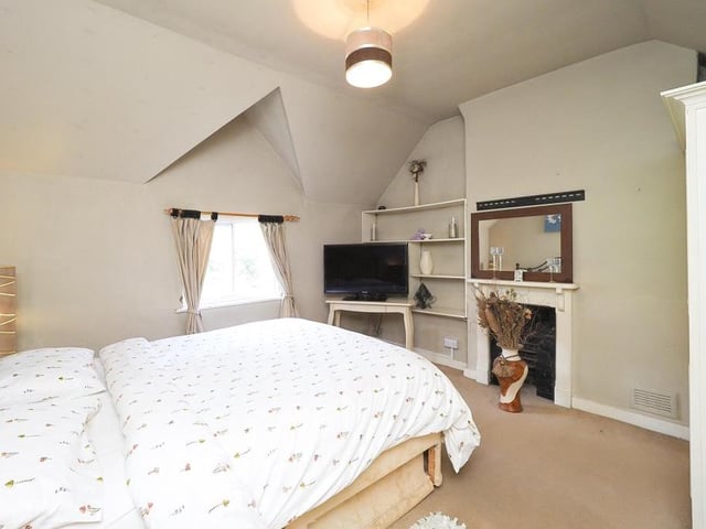 Bedroom number two oozes character, thanks largely to its feature fireplace. Facing the front of the cottage, it also boasts a fitted wardrobe.