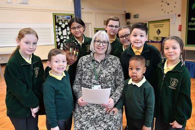 St. Joseph's Catholic Primary School headteacher Debra Hargreaves alongside pupils after the news of their "good" Ofsted report.
