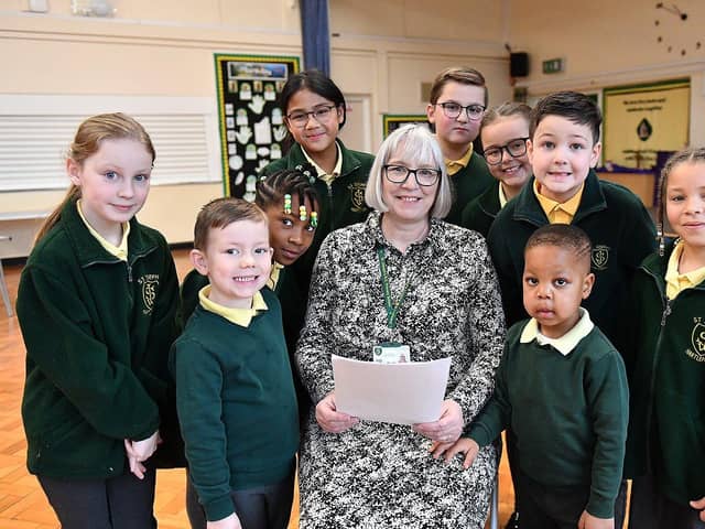 St. Joseph's Catholic Primary School headteacher Debra Hargreaves alongside pupils after the news of their "good" Ofsted report.