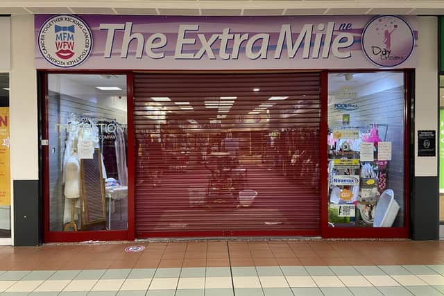 The Extra Mile charity shop.