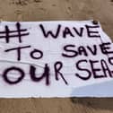 Wave to save our seas banner on Seaton Carew beach, August 2022.