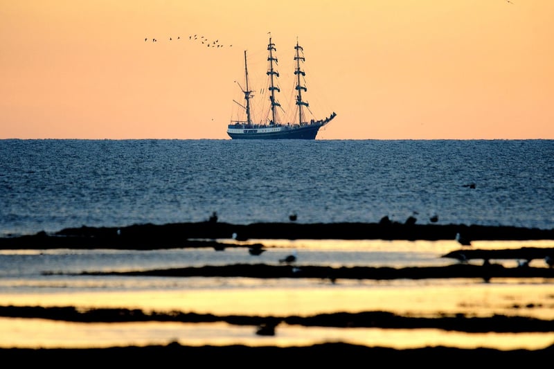 The Tall Ships set sail, embarking on their next adventure.