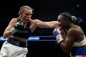 LONDON, ENGLAND - OCTOBER 15: Savannah Marshall (L) punches Claressa Shields (R) during the IBF, WBA, WBC, WBO World Middleweight Title fight on the Shields vs Marshall Boxxer fight night which is the first women's only boxing card in the UK at The O2 Arena. (Photo by James Chance/Getty Images)