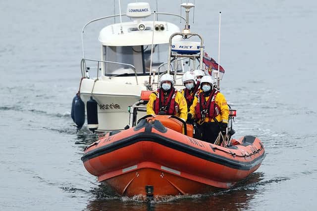 Hartlepool RNLI inshore lifeboat Solihull pictured towing the casualty vessel. Photo by RNLI/Tom Collins.