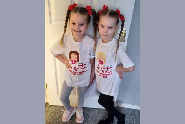 Lola and Summer, age 6, show off their bespoke t-shirts.