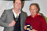 Former Hartlepools United and Nottingham Forest European Cup winner John McGovern with his medal arranged by Paul 'Goffy' Gough (left).